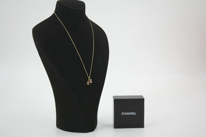 Chanel Vintage 05P Metal Doll Head & Red CC Necklace