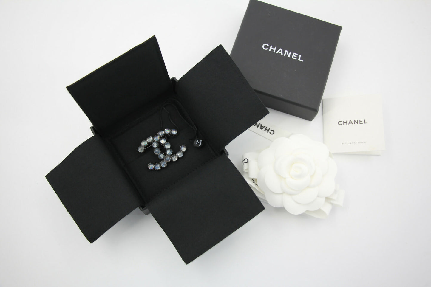 Chanel 17K Rhinestone Starlight Blue CC Brooch