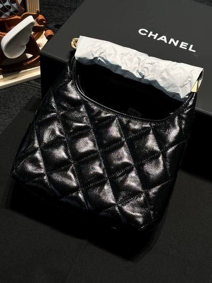 Chanel 24A black and gold waxed leather, small size cross body bag