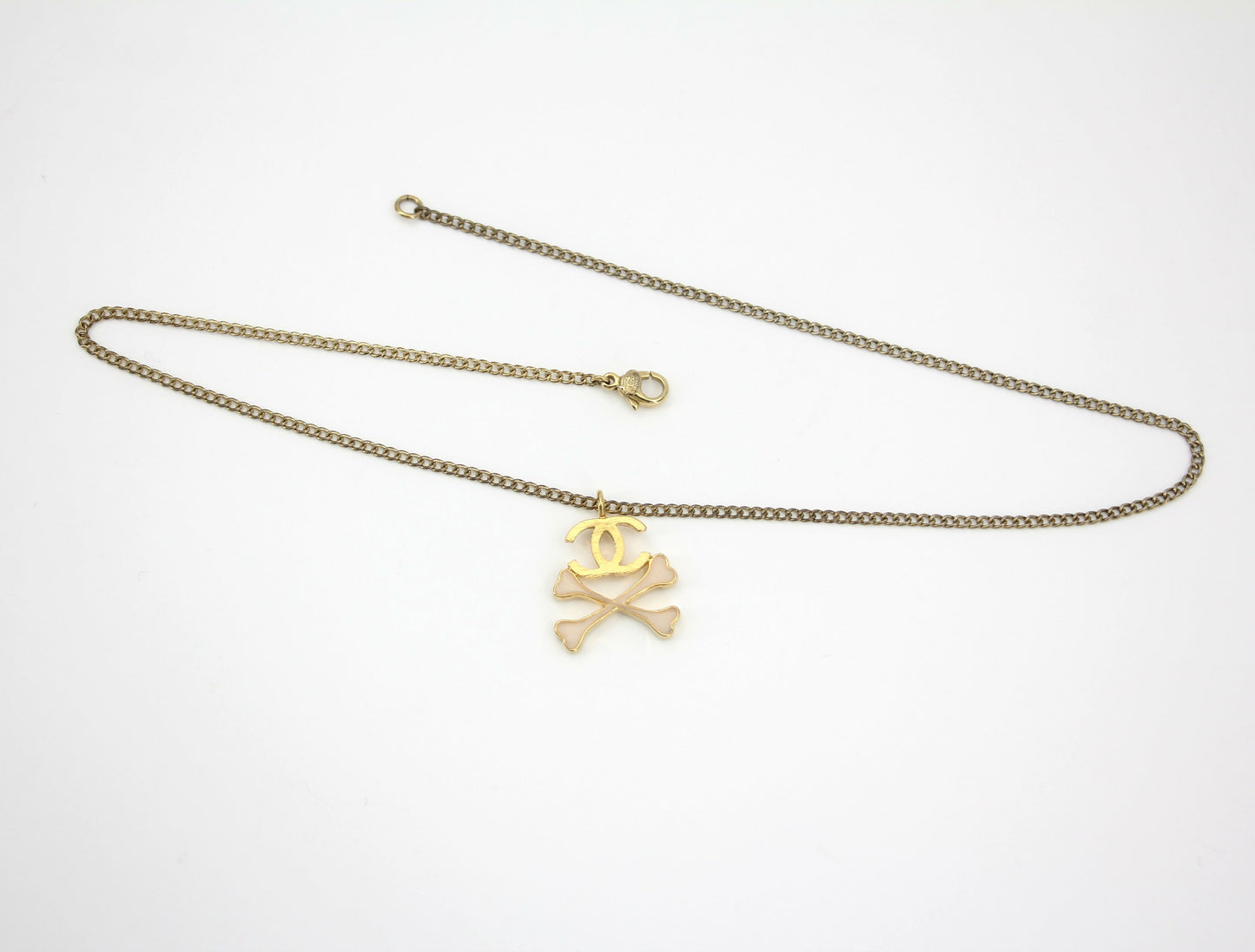 Chanel Vintage 03P Gold-plated CC Enamel White Skull Necklace