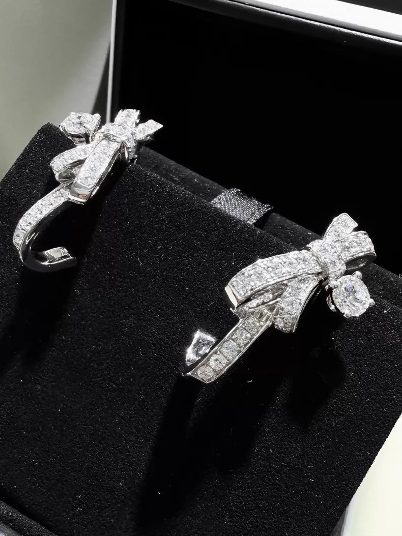 CHANEL earrings, white gold, full diamond bow, c
