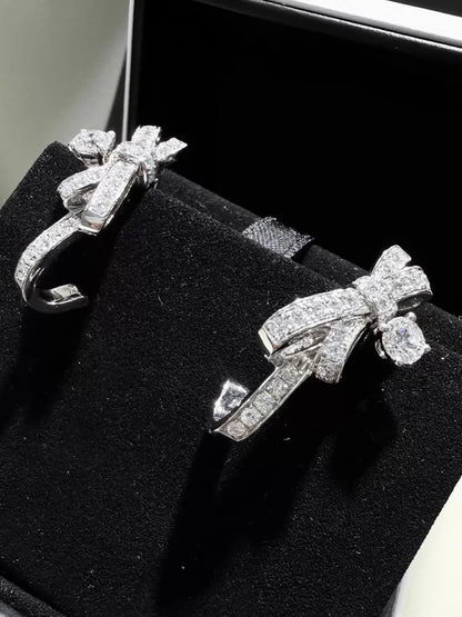 CHANEL earrings, white gold, full diamond bow, c