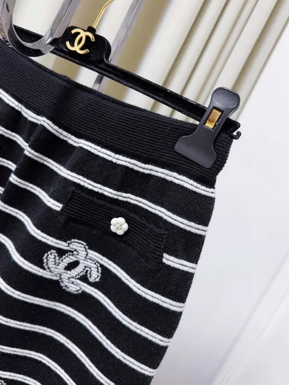 Chanel 23k black and white striped camellia double C logo knit shorts