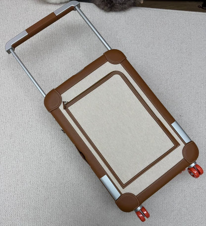 Hermes gold-brown cargo suitcase