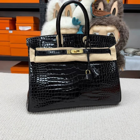 Hermes Birkin 35 black shiny crocodile leather gold hardware
