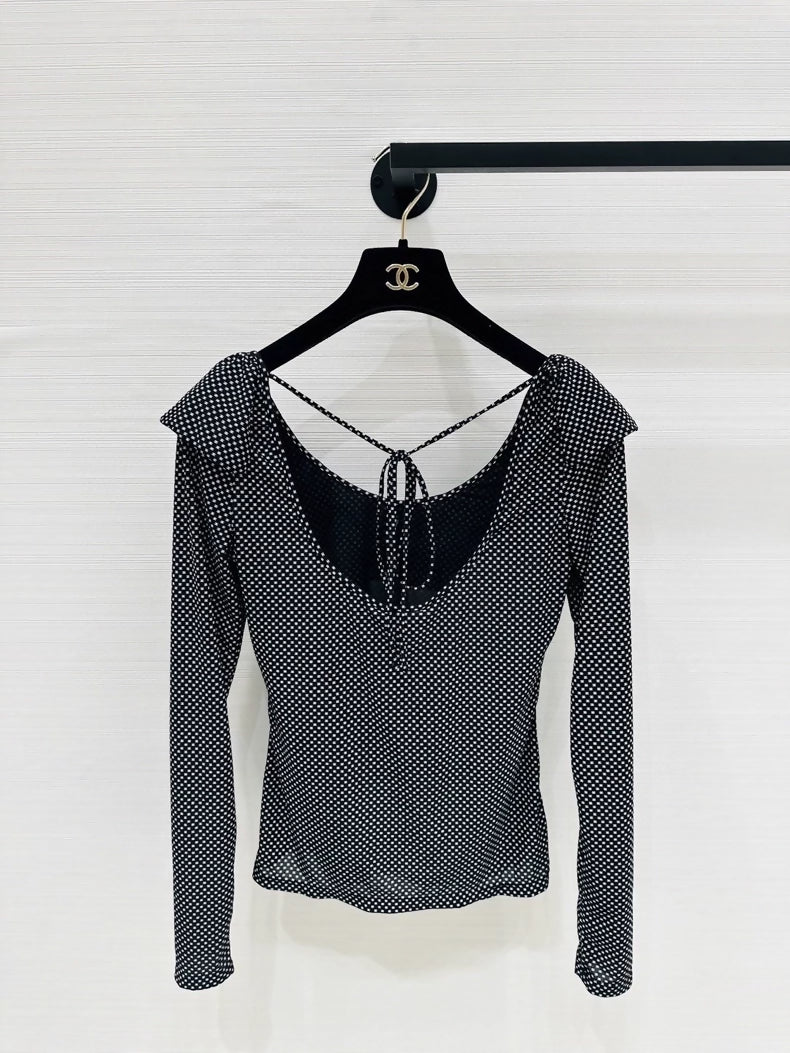 Chanel 24b top with ruffles and double C logo