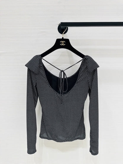 Chanel 24b top with ruffles and double C logo