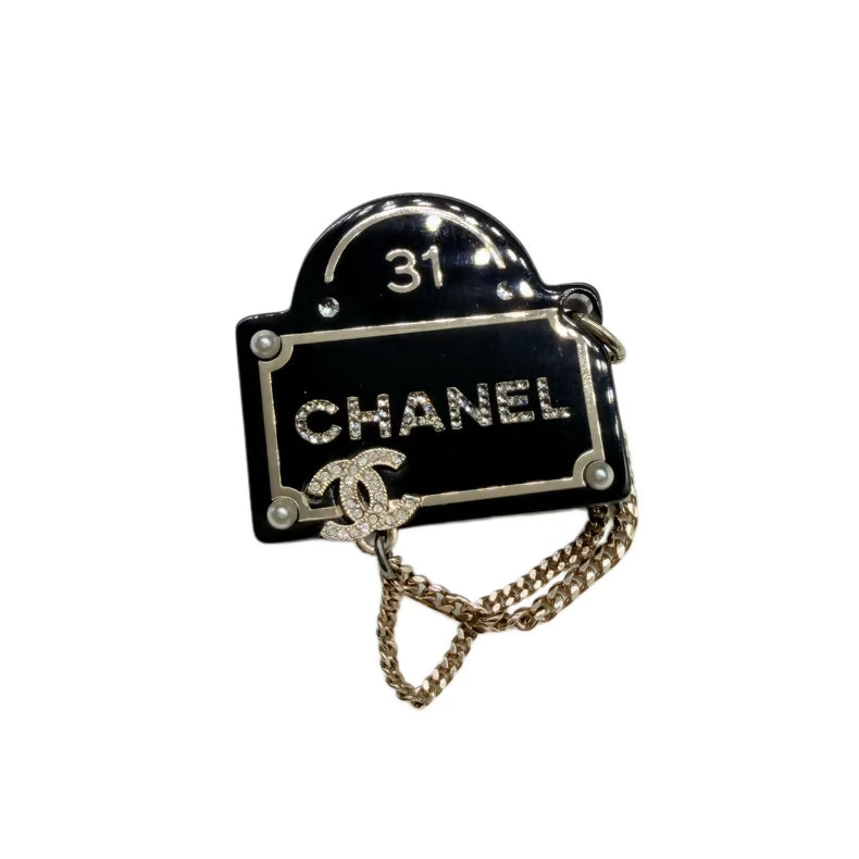 CHANEL acrylic tassel brooch