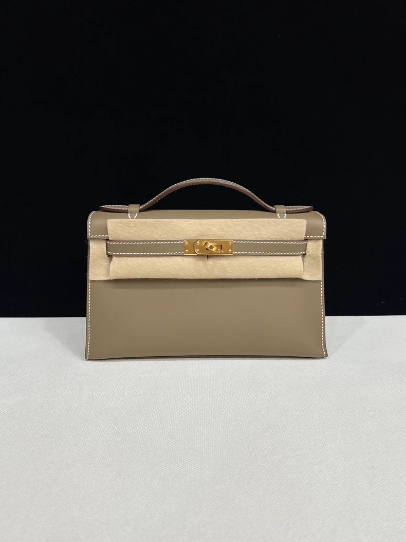 Hermes Kelly pochette étoupe grey swift leather with gold hardware
