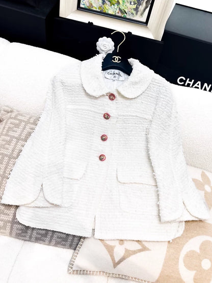 Chanel 17P white tweed jacket with pink lion button
