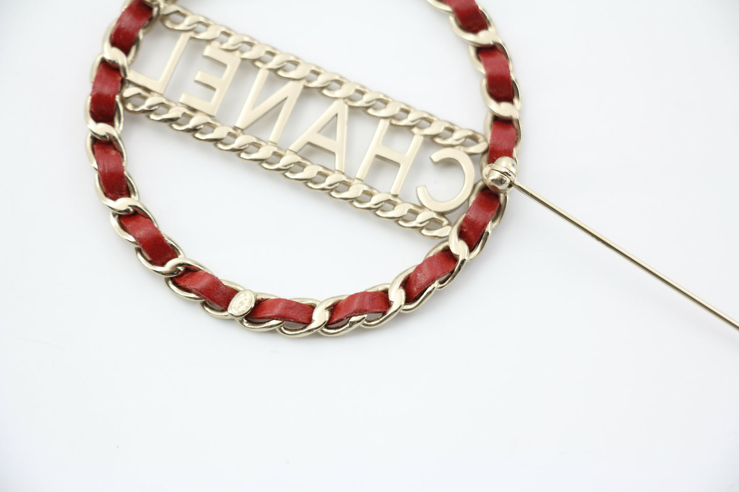 Chanel B18K Leather Red Metal Round Brooch