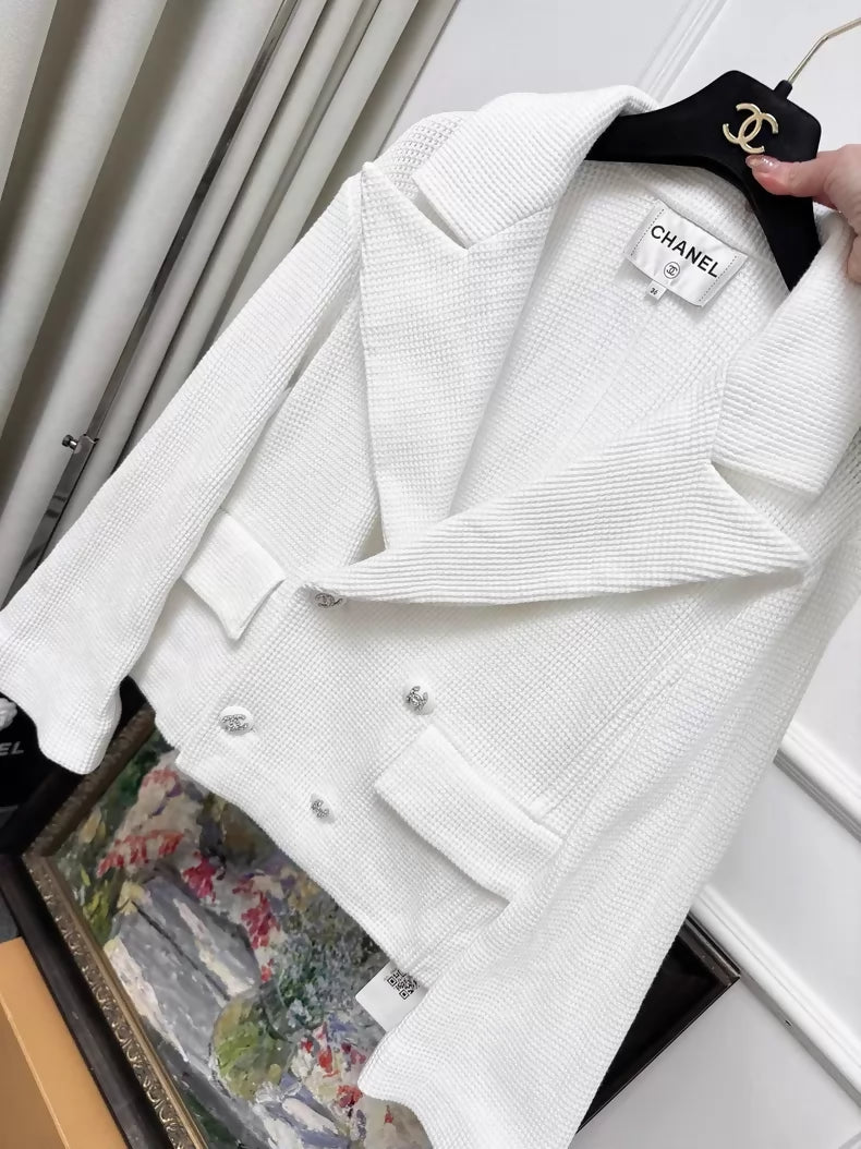 Chanel 21C white tweed jacket with rhinestone buttons