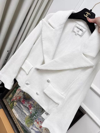 Chanel 21C white tweed jacket with rhinestone buttons