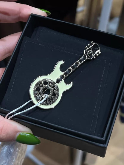 Chanel 24A guitar brooch