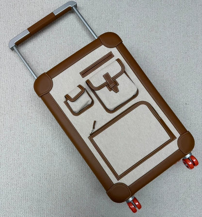 Hermes gold-brown cargo suitcase