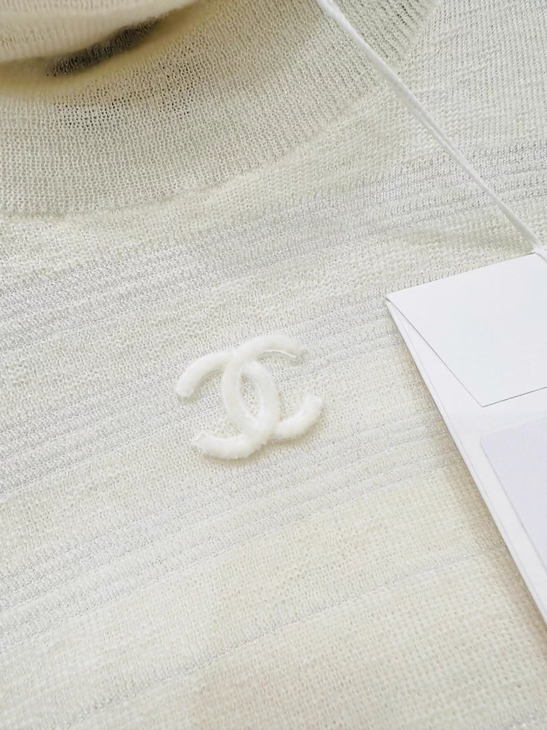 Chanel turtleneck embossed logo top