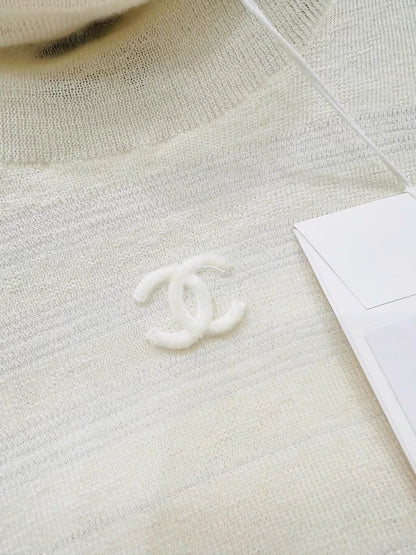 Chanel turtleneck embossed logo top