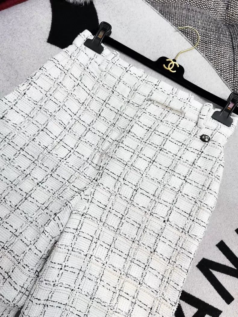 Chanel 20p black and white check wide-leg trousers