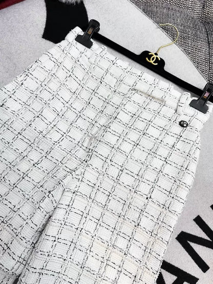 Chanel 20p black and white check wide-leg trousers