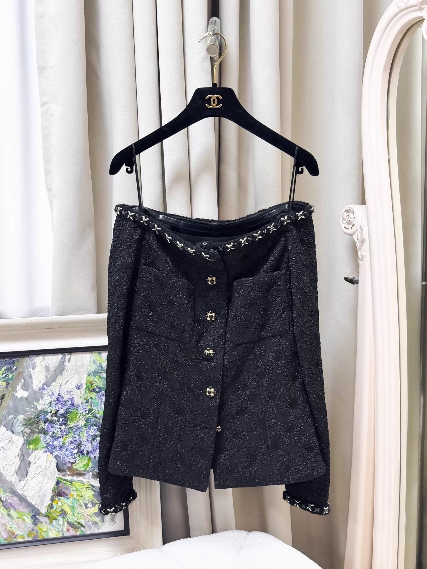Chanel 21A black embossed camellia off-the-shoulder tweed jacket