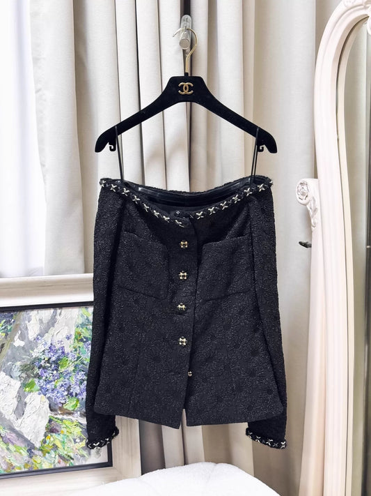 Chanel 21A black embossed camellia off-the-shoulder tweed jacket