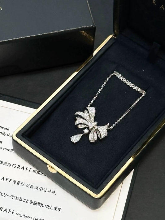 Tilda
s Bow Graff necklace in white gold 
diamonds