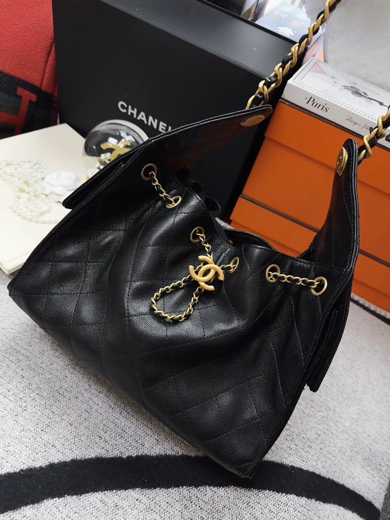 Chanel 25 hobo bag black and gold lychee leather shoulder bag