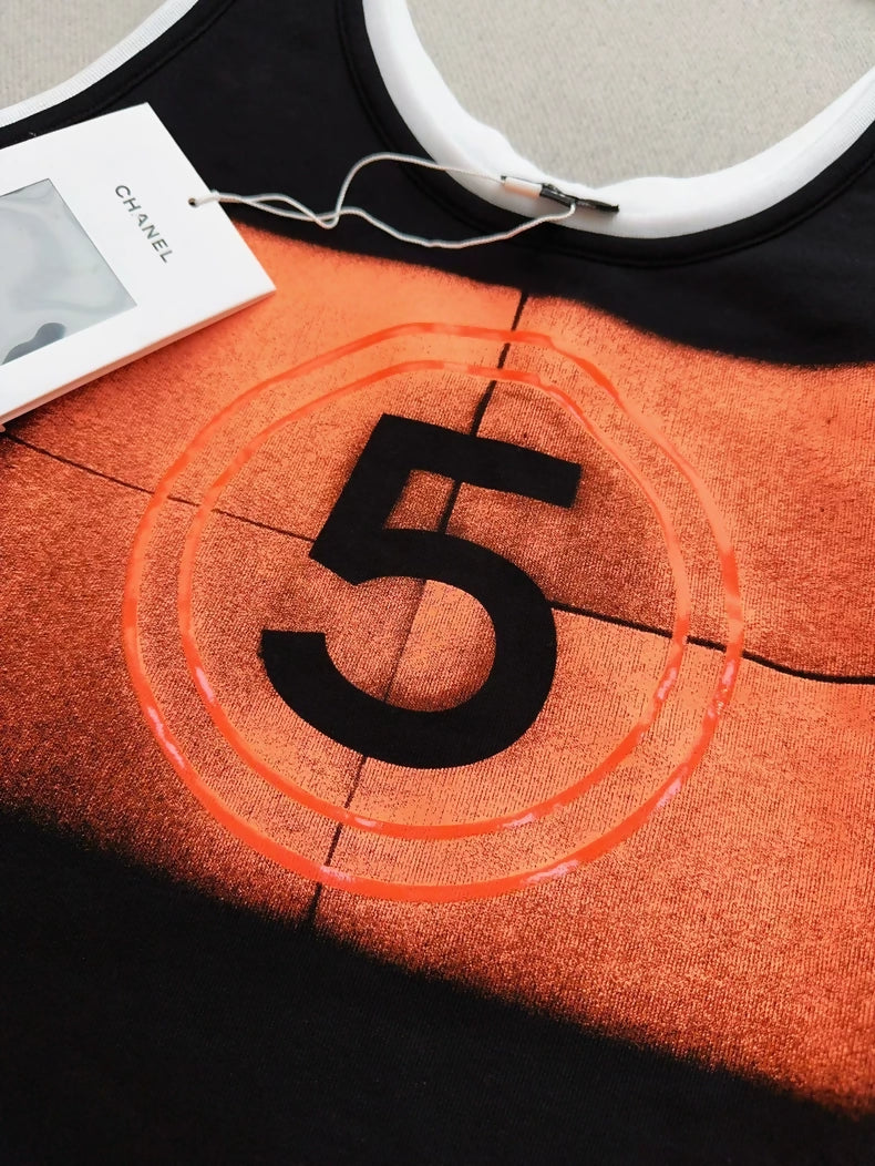 Chanel 21S black and orange No. 5 top