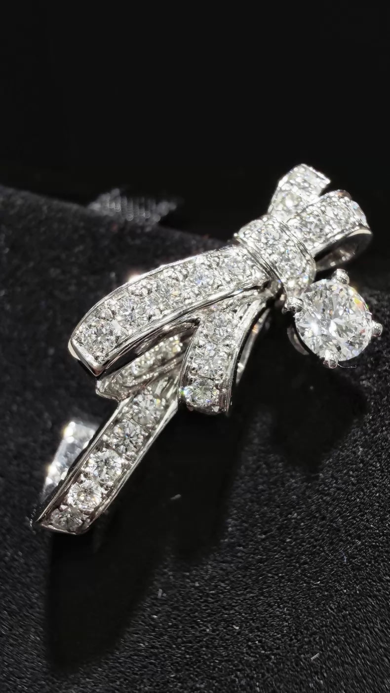 CHANEL earrings, white gold, full diamond bow, c
