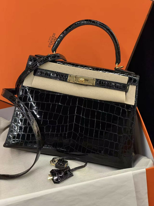 Hermès Kelly 28 Noir Shiny Niloticus Crocodile with Gold Hardware