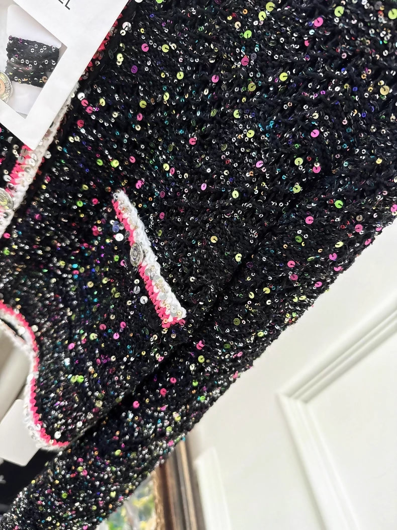 Chanel 24C black cardigan with pink trim and colorful sequins