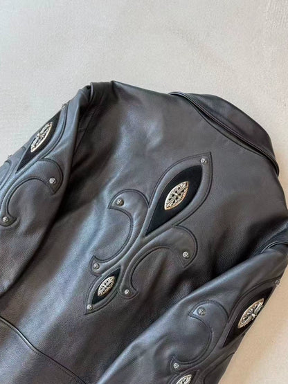 Chrome Hearts leather motorcycle jacket with silver iris embellishments on the arms and back.