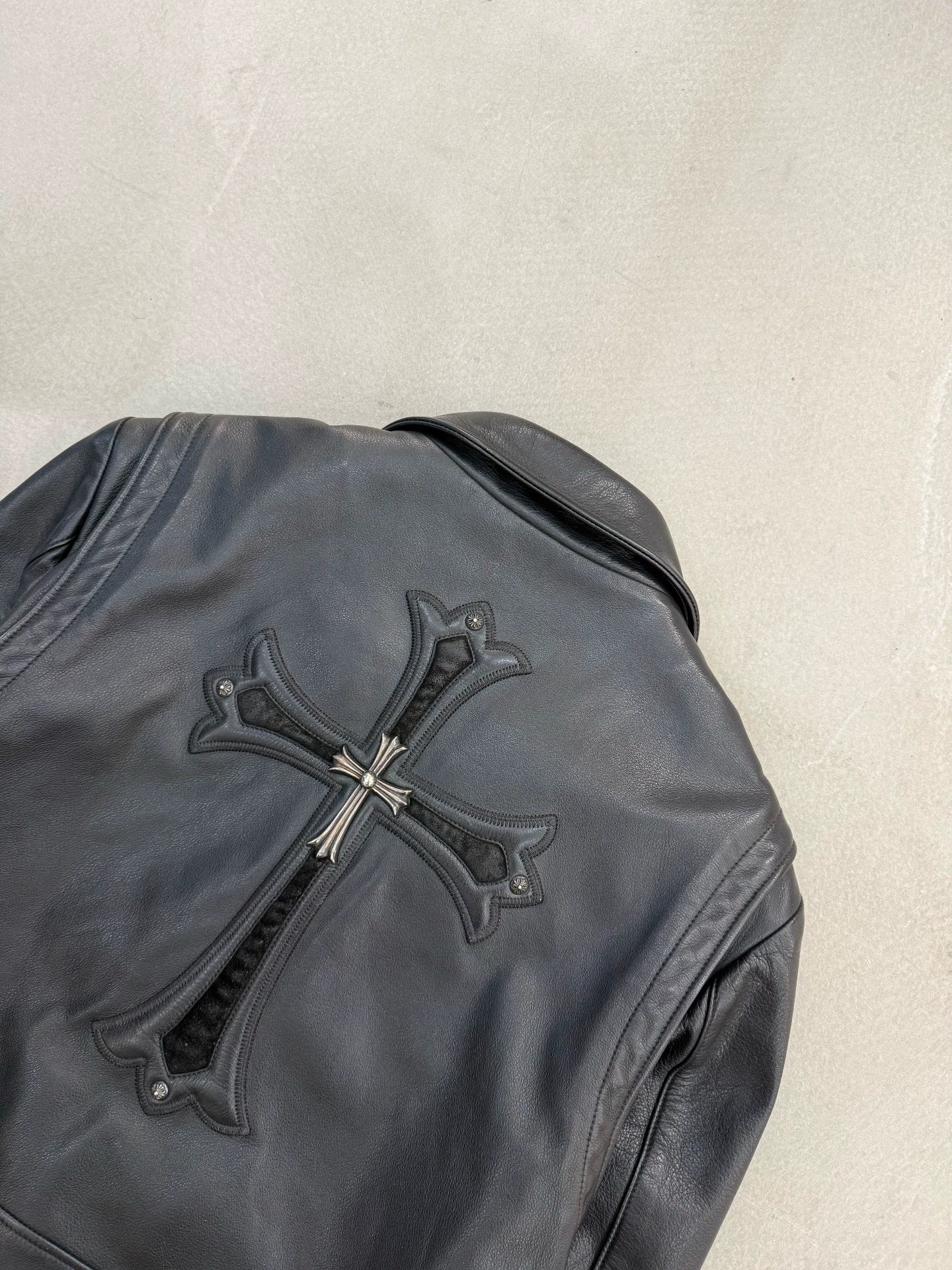 Chrome Hearts leather motorcycle jacket with silver cross detail on the back