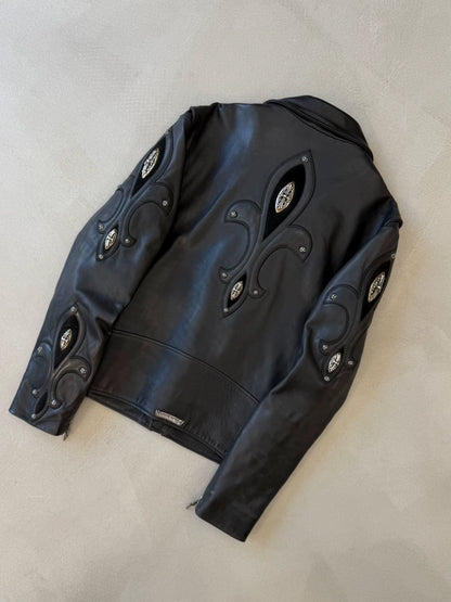 Chrome Hearts leather motorcycle jacket with silver iris embellishments on the arms and back.