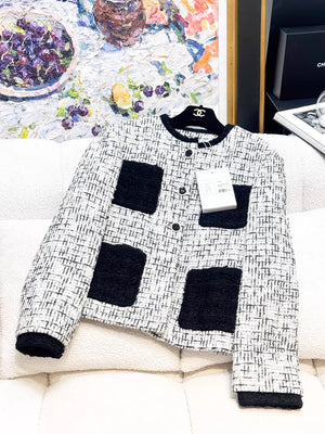 Chanel 22C black and white tweed jacket