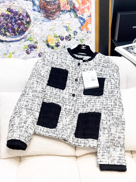 Chanel 22C black and white tweed jacket