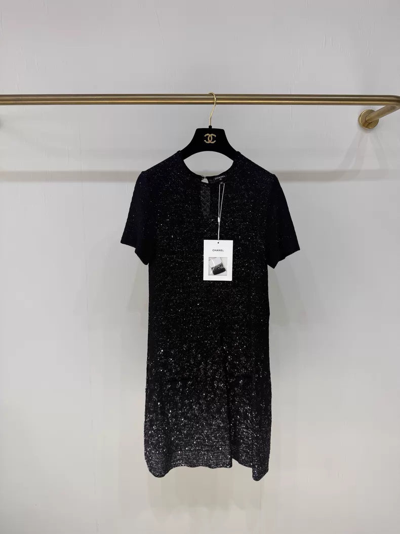 Chanel 25P black shimmering dress