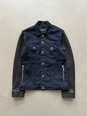 Chrome Hearts denim jacket with leather sleeves and a flame pattern on the back