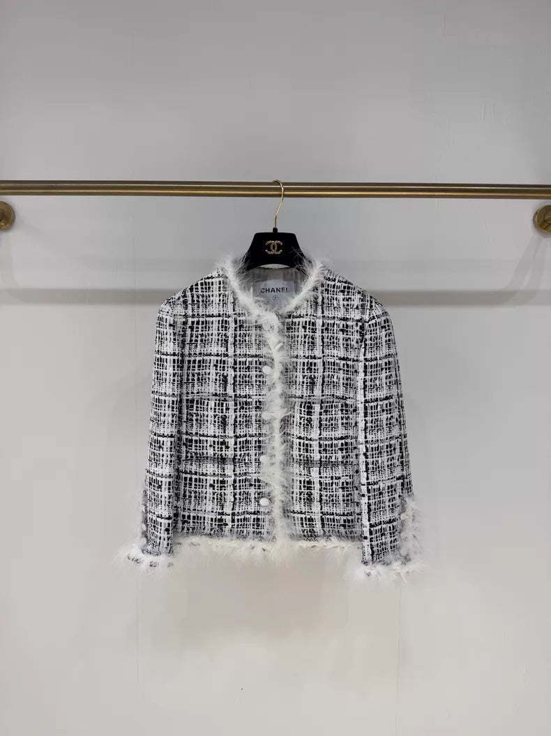 Chanel 25S black and white tweed jacket