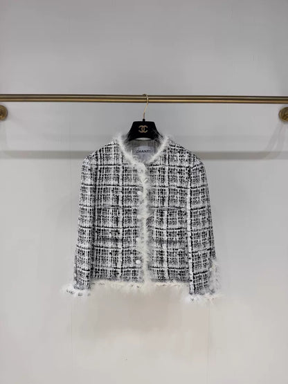 Chanel 25S black and white tweed jacket