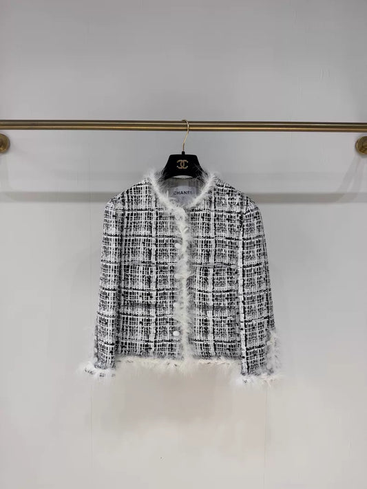 Chanel 25S black and white tweed jacket