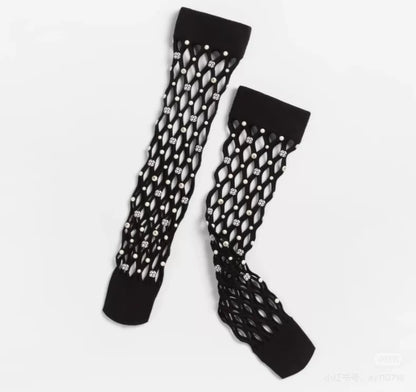 Chanel 25B black camellia knee-high socks