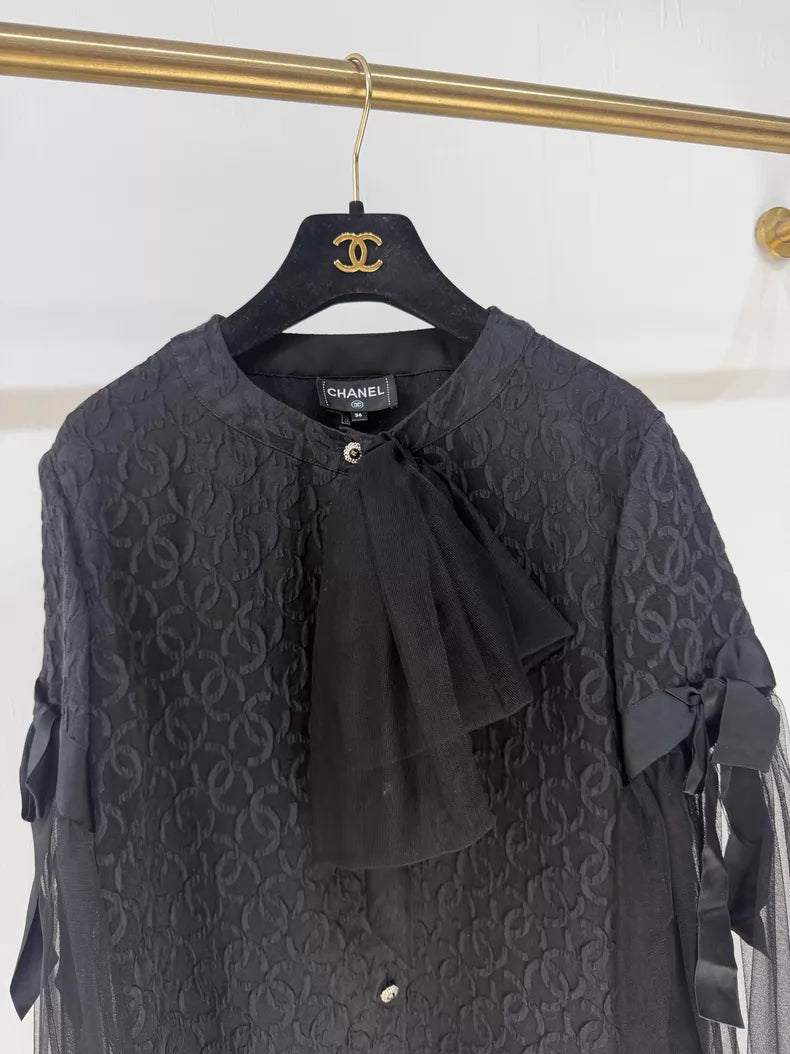 Chanel 25K black blouse