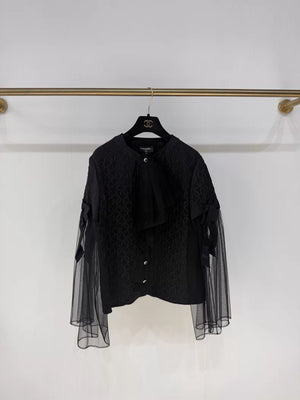 Chanel 25K black blouse