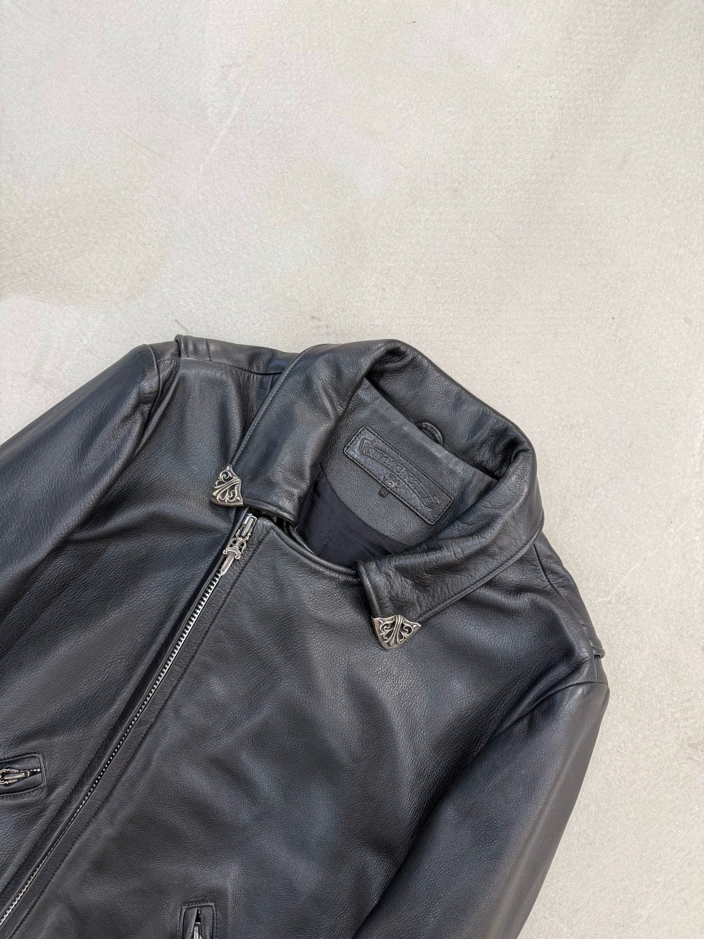 Chrome Hearts leather motorcycle jacket with silver cross detail on the back