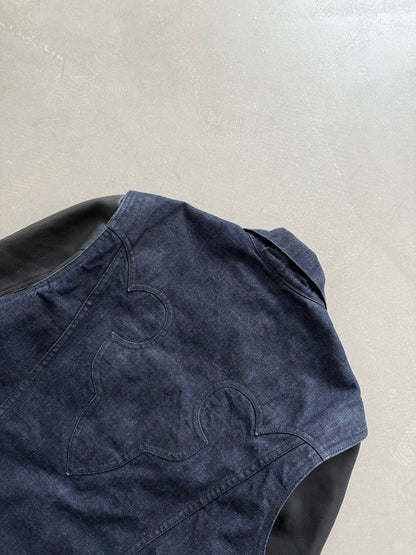 Chrome Hearts denim jacket with leather sleeves and a flame pattern on the back