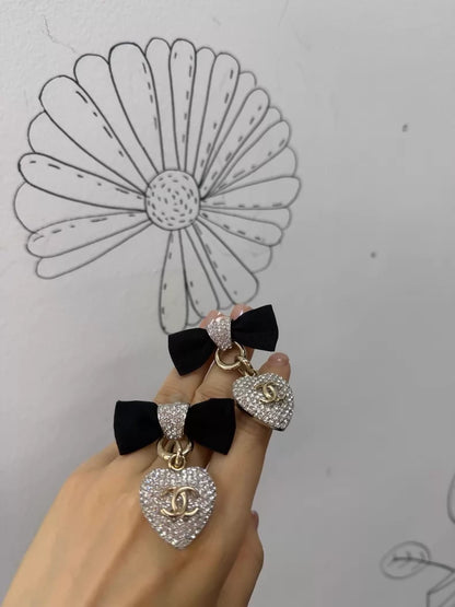 Chanel mini rhinestone heart bow earrings