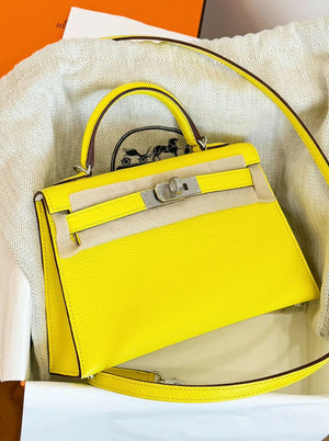 Hermès Mini Kelly II Jaune Milton Evercolor Leather paired with Nata / Craie Interior & Palladium Hardware K Stamp