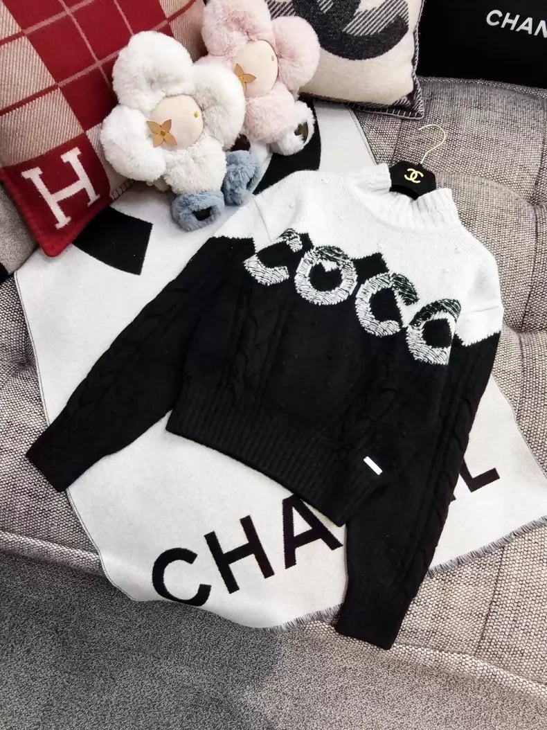Chanel Coco Neige Ski Collection Black and White Knit Sweater with Coco Logo