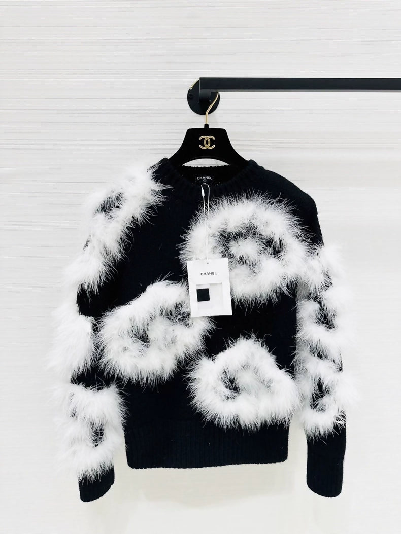 Chanel 23K black and white knit top